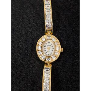 Ladies Elegant Xanadu Gold Crystal Accent Oval Quartz Dress Watch